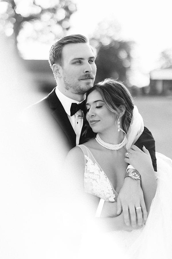 The groom holding the bride.