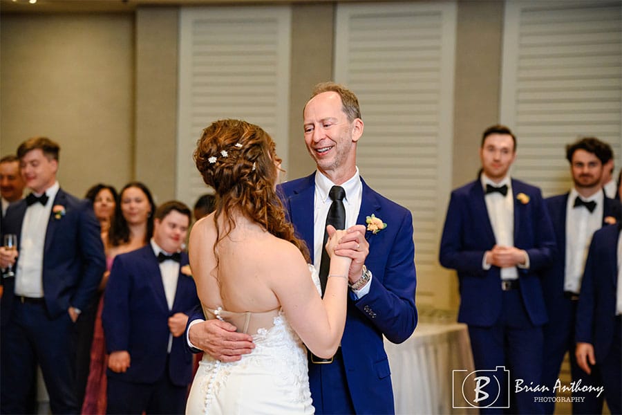 The bride dancing with her father.