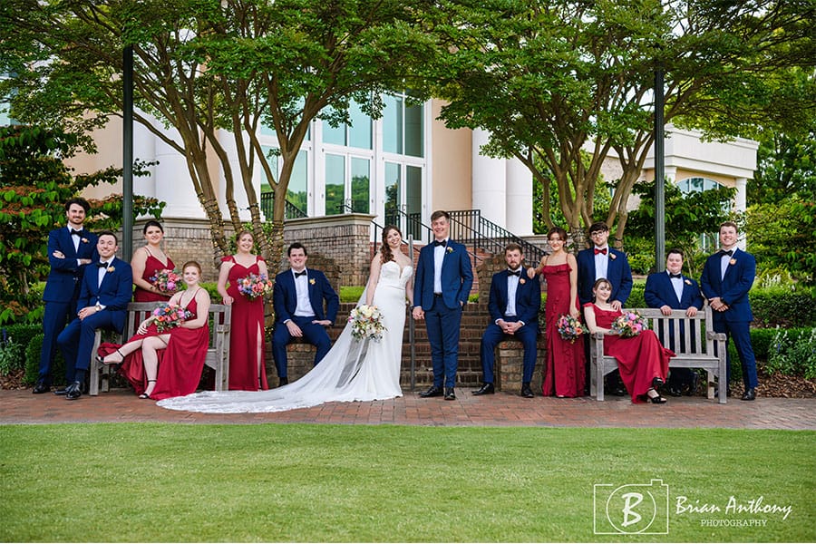 The bride and groom with their grooms men and brides maid.