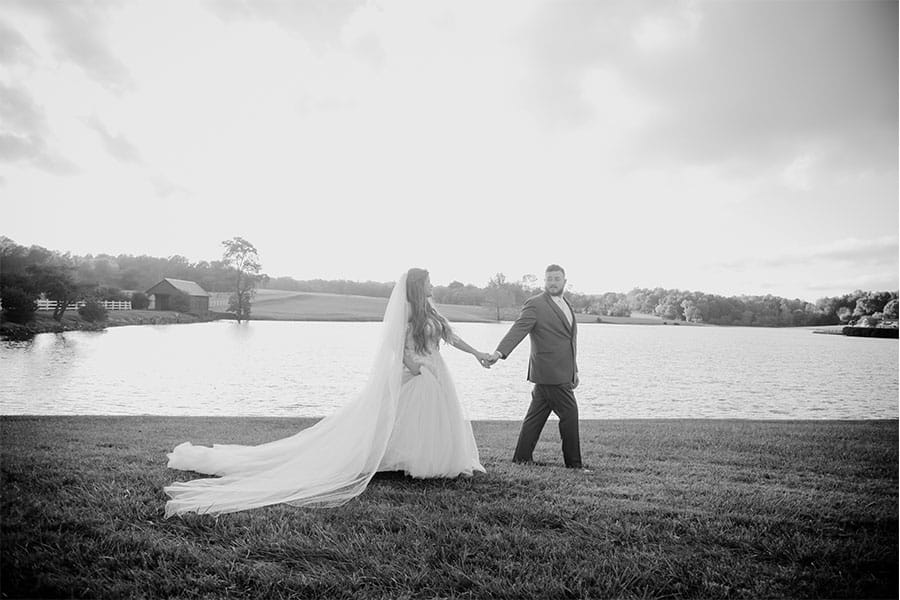 The bride and groom walking together.
