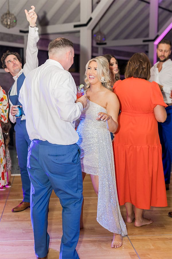The bride and groom dancing.