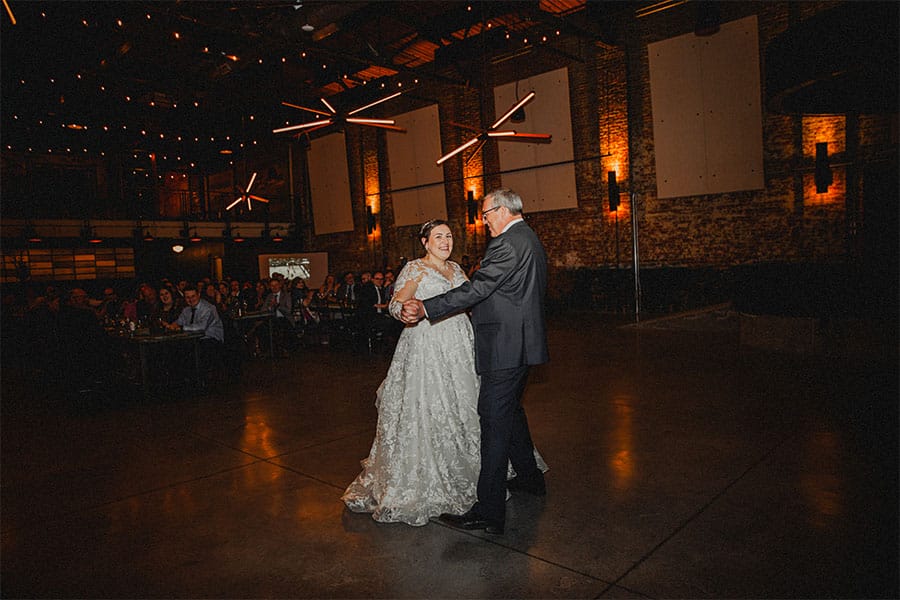The bride dancing with her father.