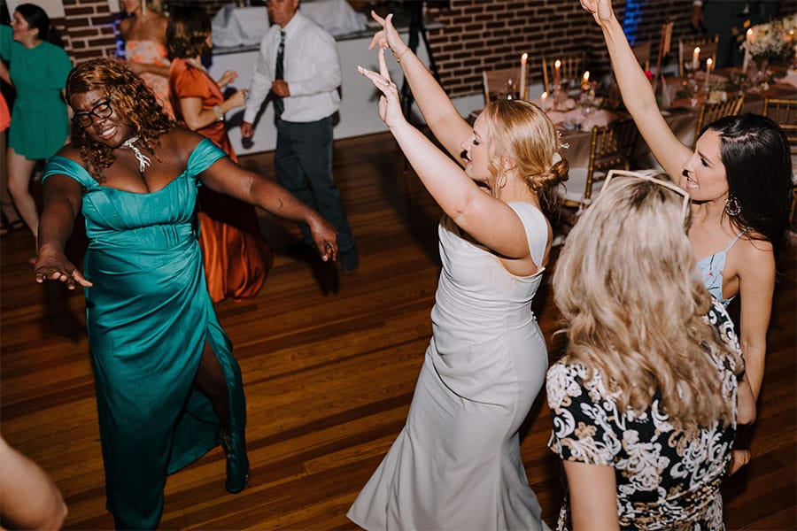 Friends and family dancing.