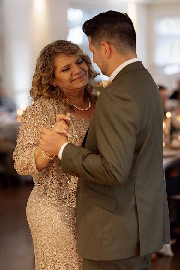 The groom dancing with his mother.