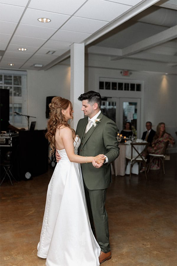 The bride and groom sharing a first dance.