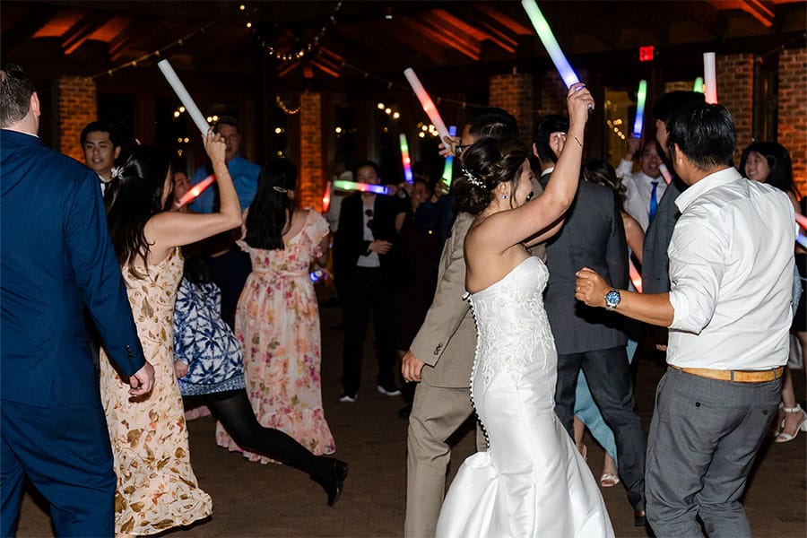 The bride and groom dancing together.