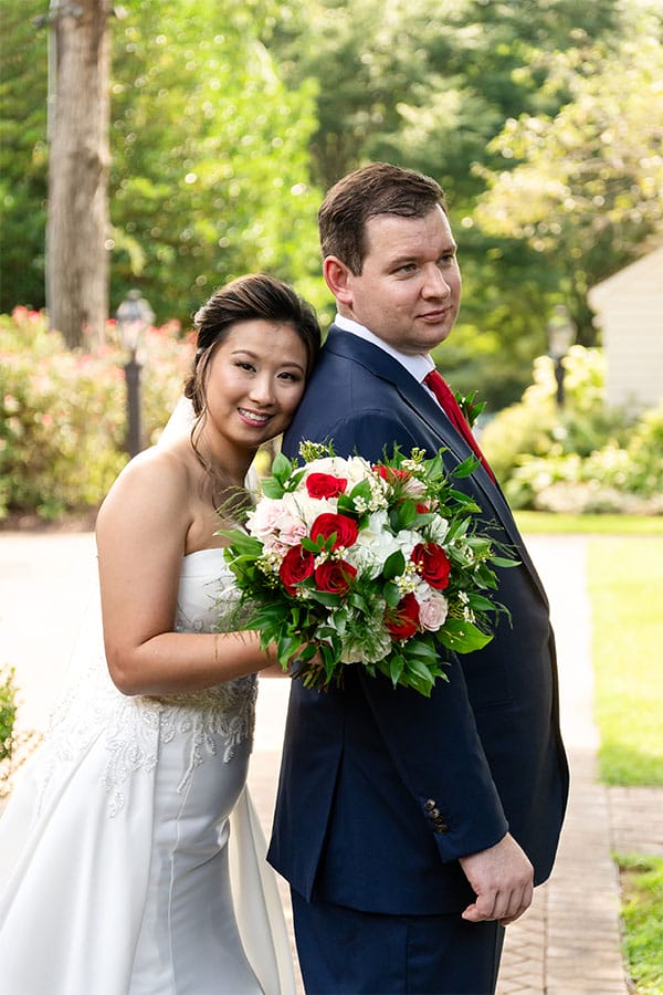 The bride and groom standing together.